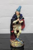 A Royal Doulton china figurine : The Pied Piper, HN 2102, height 23 cm.