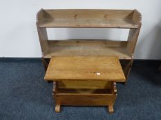 A pine magazine rack together with a set of Ikea pine open bookshelves