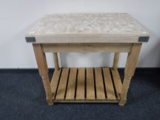 A reclaimed pine two tier butcher's block table CONDITION REPORT: 86cm high by 93cm