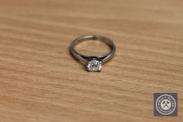 An 18ct white gold diamond solitaire ring,