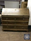 A late nineteenth century oak bureau