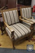 An early 20th century carved oak armchair CONDITION REPORT: In good condition with