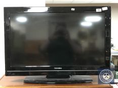 A Toshiba 32 inch LCD TV with remote