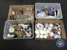 Four boxes of miscellaneous china and glass ware including mugs, figures,