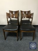 A set of four mid 20th century Danish teak dining chairs