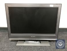 A Sony Bravia 26 LCD TV with remote