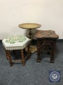 A carved plant stand together with a gilt wine table and hexagonal footstool