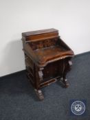 A reproduction mahogany Davenport