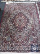 A Tabriz design rug,
