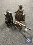 Two Art Deco fire companions, knight and lady,