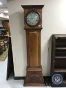 A continental mahogany longcase clock with painted dial,