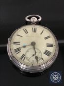 A silver key wound open face pocket watch