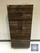 A contemporary narrow six drawer chest in walnut high gloss finish