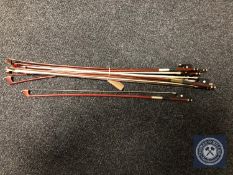 A quantity of violin bows CONDITION REPORT: There are no apparent maker's names.