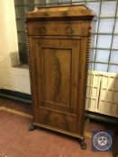 A 19th century mahogany sentry door cabinet on claw feet