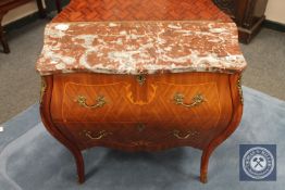 A reproduction ormolu mounted and marble topped two drawer bombe chest,