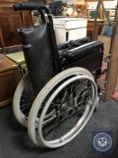A folding Wheeltech wheel chair