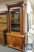 A 19th century mahogany cabinet on stand,