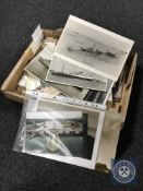 A box of photographs and album including street scenes,