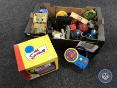 A box of a collection of novelty radios,