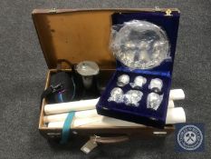A vintage leather case containing plated tray and goblets, small collection of pen knives,