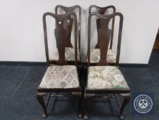 A set of four mahogany Queen Anne style chairs