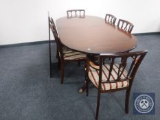 A reproduction mahogany twin pedestal dining table,