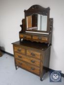 An Edwardian walnut mirrored dressing table