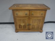 A Barker and Stonehouse flagstone two drawer side cabinet