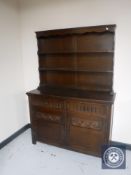 A carved oak dresser