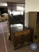 An antique inlaid mahogany marble topped hall cupboard with similar hall mirror