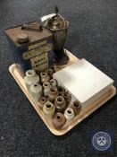 A tray of early twentieth century brass lamp, Granville anti freeze tin,