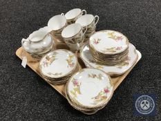 A tray of thirty-six pieces of Collingwood tea china