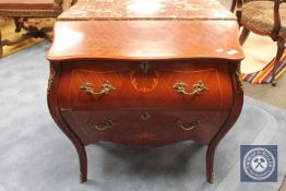 A reproduction ormolu mounted two drawer bombe chest,