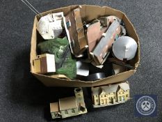 A box of railway accessories,