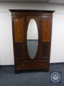 A Victorian inlaid mahogany wardrobe CONDITION REPORT: Width 129cm.