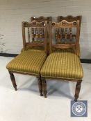 A set of four Edwardian mahogany dining chairs
