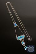 An Art Nouveau silver and enamel pendant on chain by Charles Horner CONDITION REPORT:
