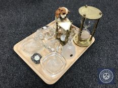 A tray of two brass and glass hour glass timers, figure of a spaniel, glass figure,
