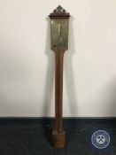 A continental mahogany stick barometer