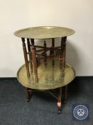 Two folding Eastern brass topped tables