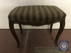 A French upholstered dressing table stool