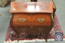 A reproduction ormolu mounted bombe two drawer chest,