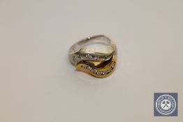 An 18ct gold yellow and white gold ring set with 12 diamonds, 14.