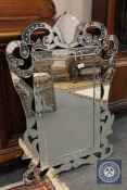 A Venetian style mirror,