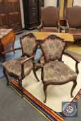 A pair of Victorian mahogany salon armchairs.