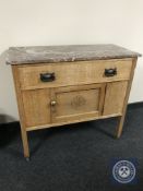 An early 20th century oak marble topped washstand