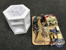 A basket of jewellery stand, trinkets, boxed and unboxed die cast vehicles, etc.