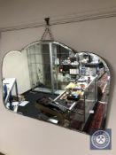 An early 20th century unframed mirror