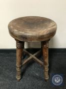 A circular farmhouse kitchen stool